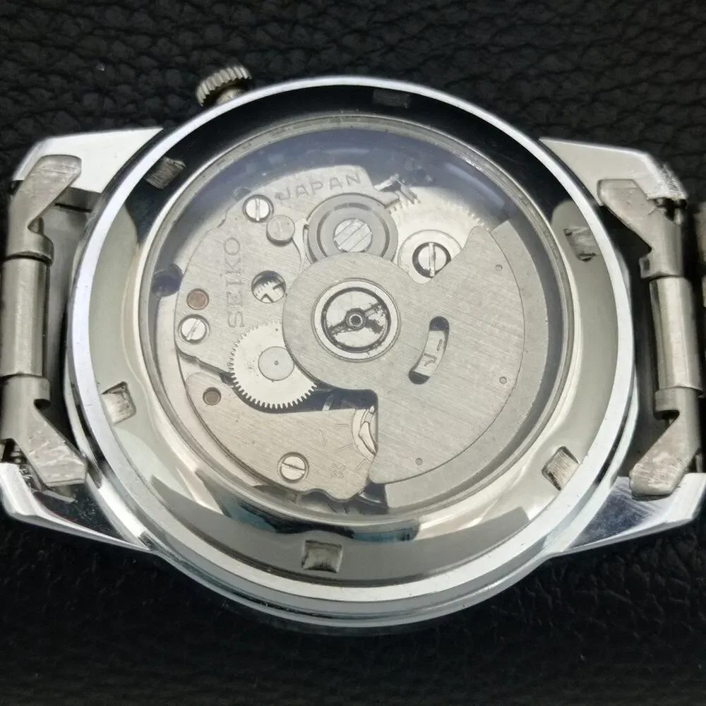 Vintage 1975 Seiko Automatic Mens Silver Watch W/daydate & White accents